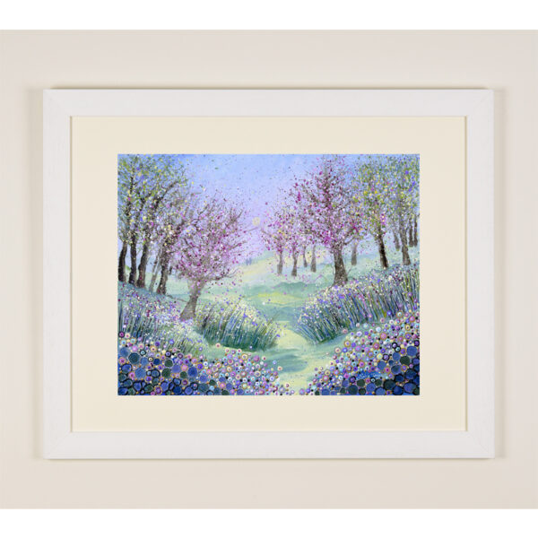 a print from a painting by Isle of Wight artist Julia Tanner which shows trees in a wood covered in pink cherry blossom