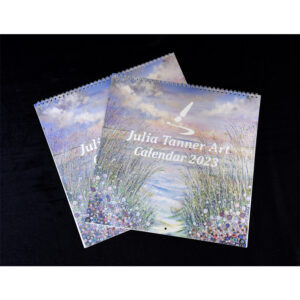 a bundle of 2 2023 Julia tanner art calendars